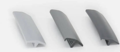 Canto en T gris perla de PVC flexible para tablero 15–16 mm.