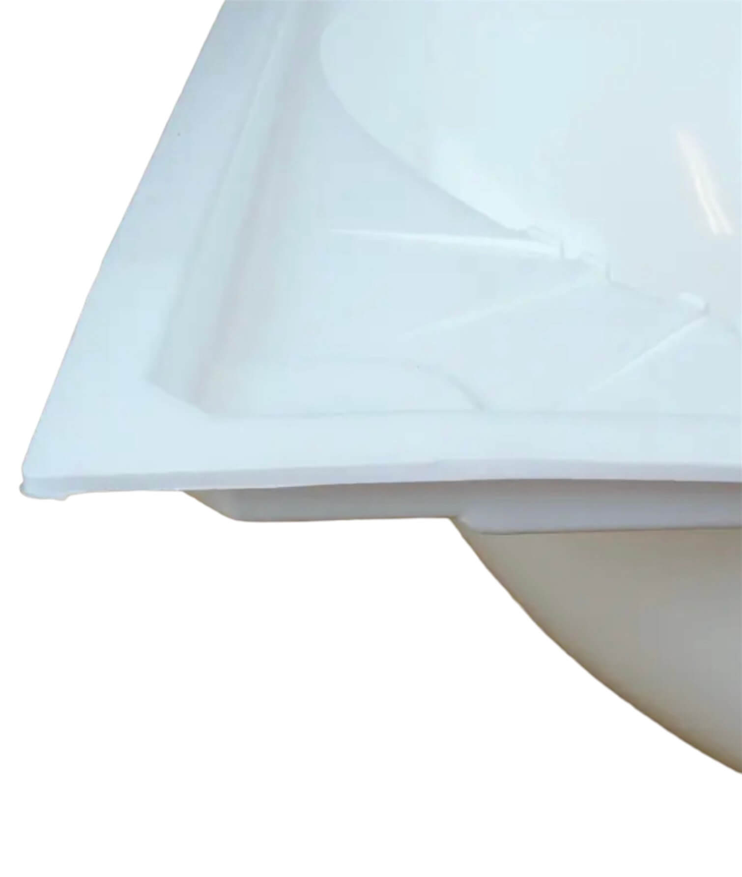 Detalle del orificio de desagüe 31 mm en lavabo esquinero 33×33.